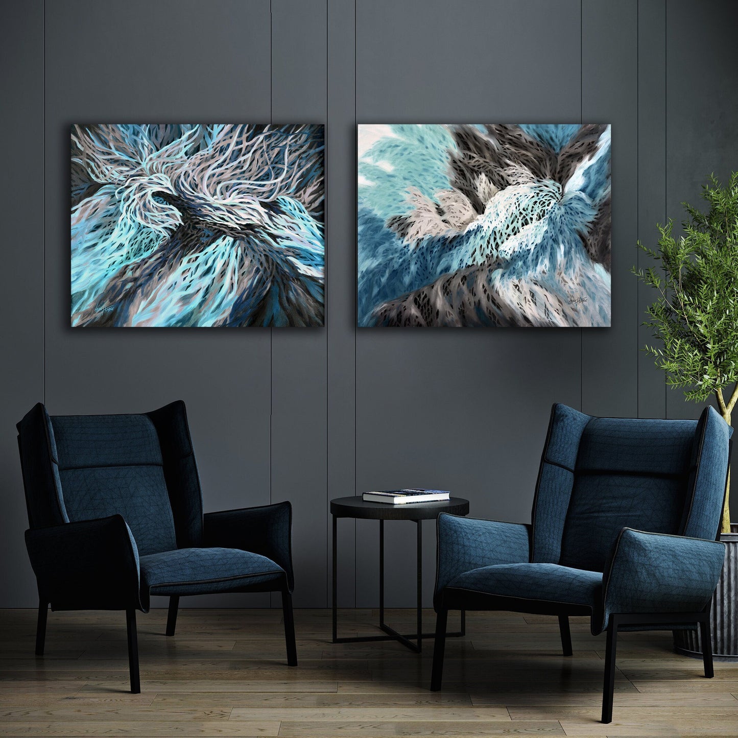Pair of abstract prints displayed in sleek black frames.