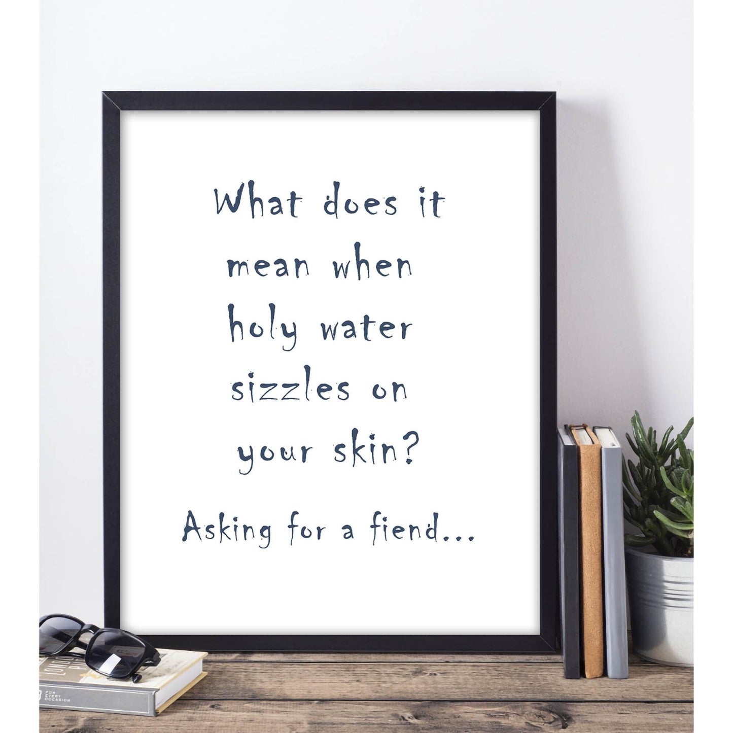Printable funny Halloween poster with the quote, "What does it mean when holy water sizzles on your skin?"
